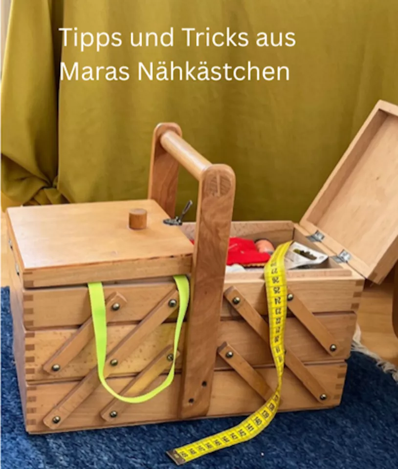 Nähkasten mit Nähutensilien und Maßband Nähkasten mit Nähutensilien und Maßband